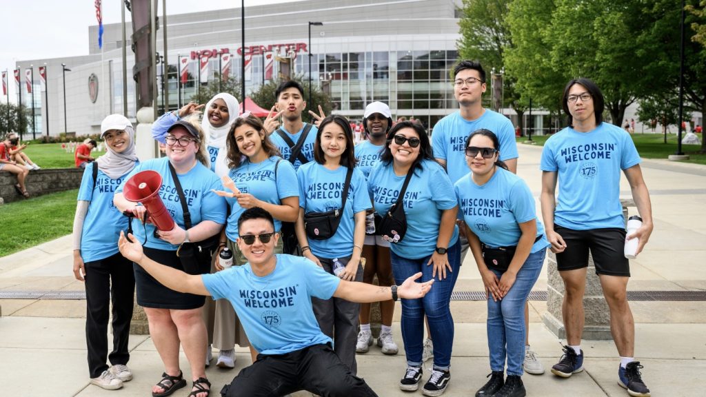 Staff from the Transfer Transition Program gather outside the Kohl Center for the Student Org Fair during Wisconsin Welcome.